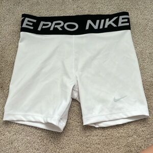 white Nike pros